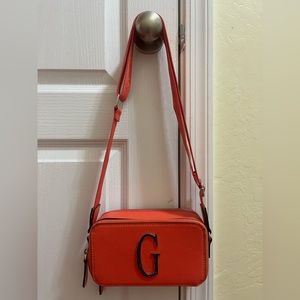 I selling Guess corssbody bag